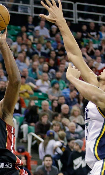 Chris Bosh, Dwyane Wade lead way as Heat hold off Jazz
